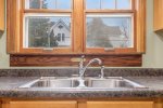 Whip Up Your Favorite Meals with the Warm Glow of the Summer Sun Shining through the Kitchen Window